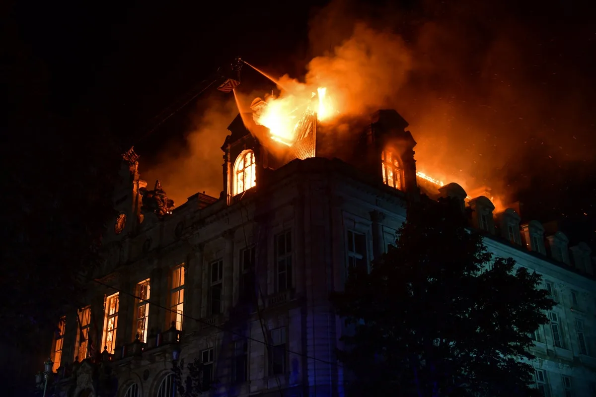 French mayor calls for Notre Dame-style rebuild after historic town hall set on fire by rioters