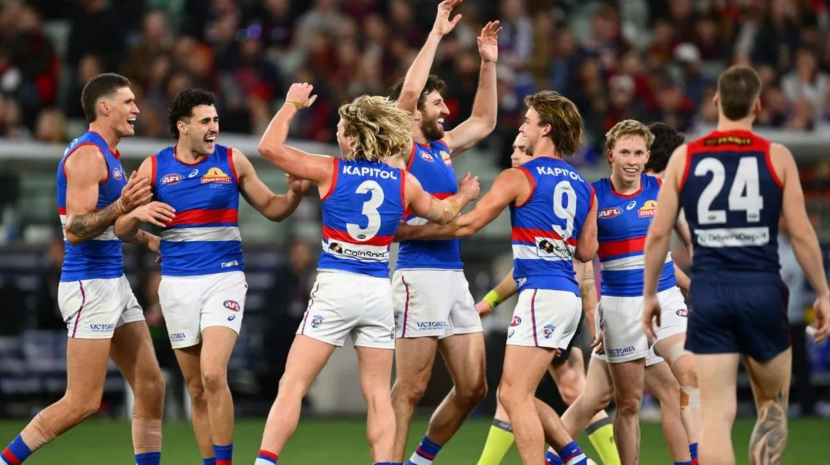 Western Bulldogs upset Melbourne to shake up AFL finals series as wildcard clash locked in