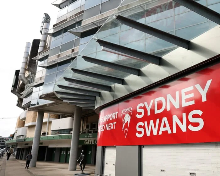 Third woman who joined Sydney Swans players in Melbourne hotel considers legal action after ‘incredibly traumatic experience’