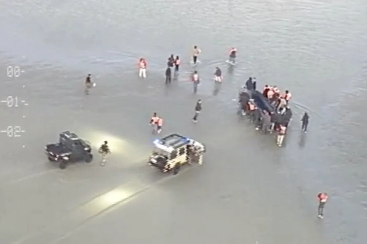 Footage shows migrants attacking French police trying to stop small boat crossing to UK