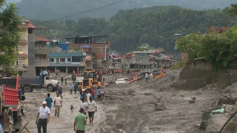 Race to rescue 900 trapped workers as floodwaters recede in Nepal