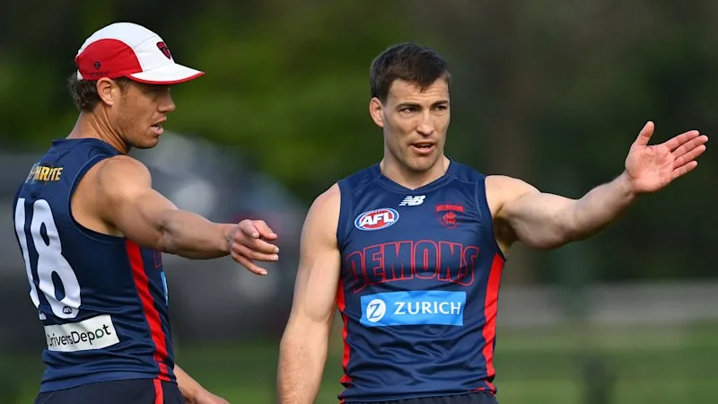 AFL wildcard finals teams and expert tips: Dees favourite son to play first game in 372 days