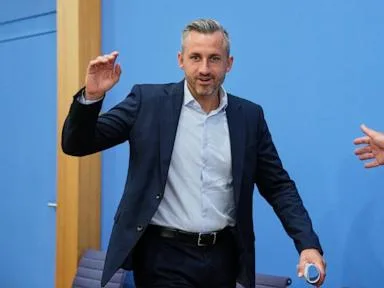 German chancellor faces pressure after far-right party wins in state election