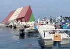 Contêineres boiam no Estreito de Hormuz após navio atingir mina e afundar