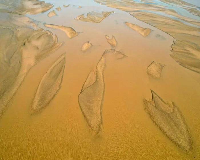Sand overextraction weakening riverbanks as concrete demand soars