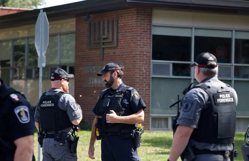 Up to 30 shots fired after man opened fire on officer outside Ontario synagogue