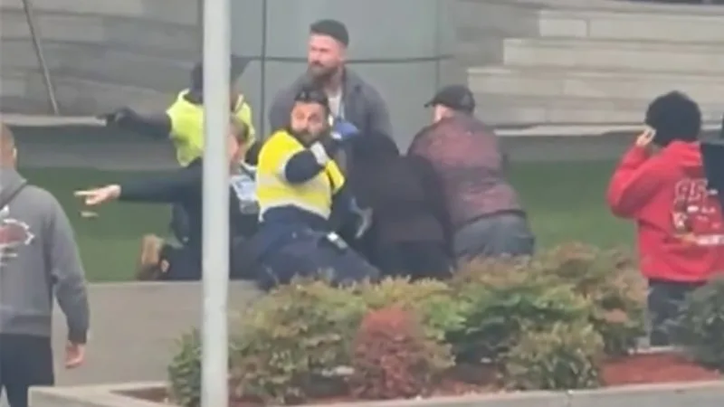 Man charged after mum stabbed, boy punched in random CBD attack