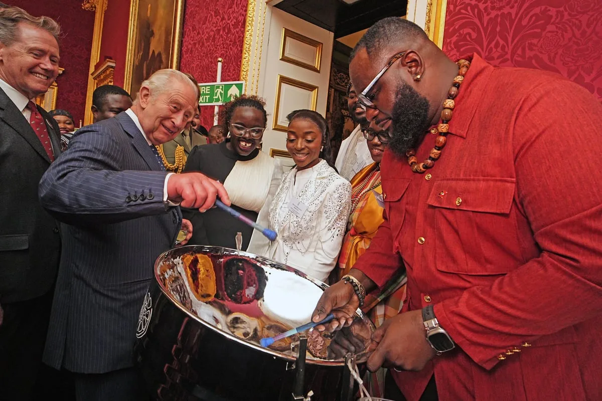 King plays steel drums at event celebrating Commonwealth diaspora