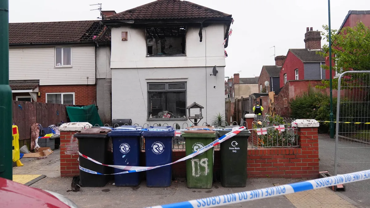 Man charged with murder over deadly house fire