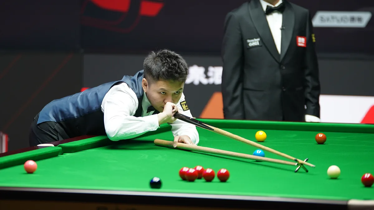 China's Zhou Yuelong clinches spot in semifinals at WST China Open