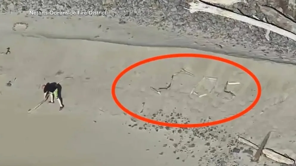 WATCH: Stranded tourists spell ‘SOS’ on Oregon beach