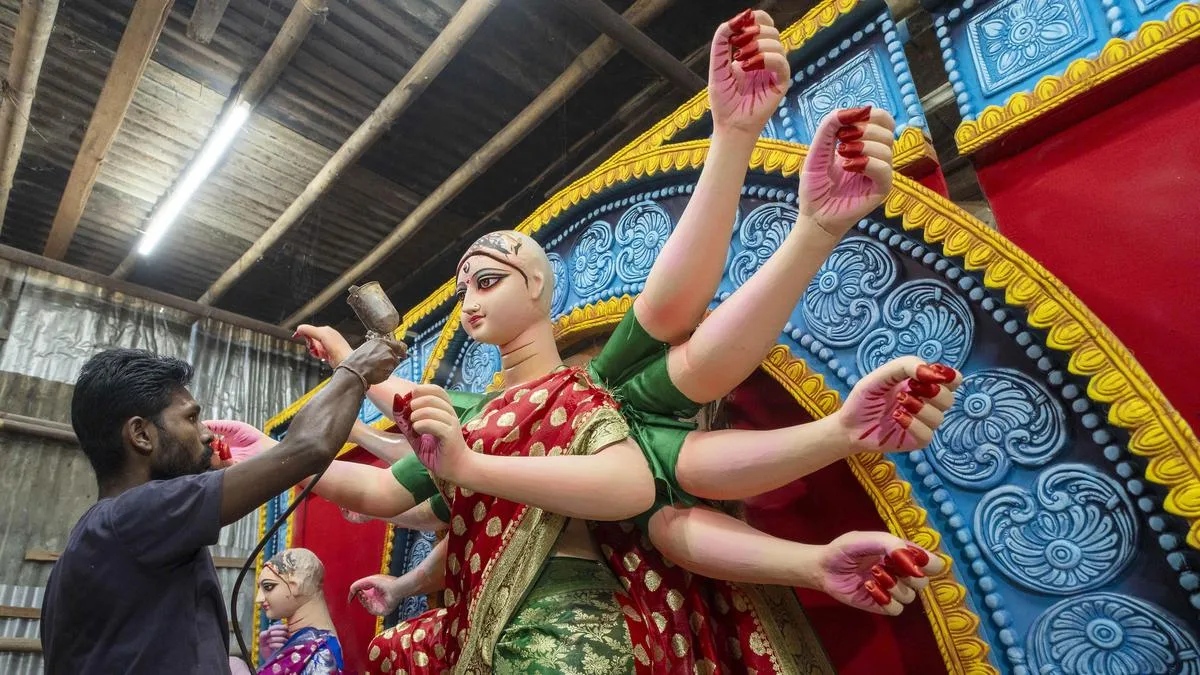 Billboard with Goddess Durga beside pot of biryani sparks row in Hooghly