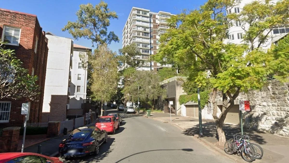 Man plunges to his death from eight-storey balcony as police wait at his front door