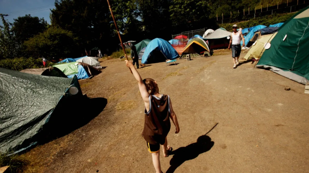 10-year-old Seattle boy enters school first time after 11 months of rescue efforts from tent life