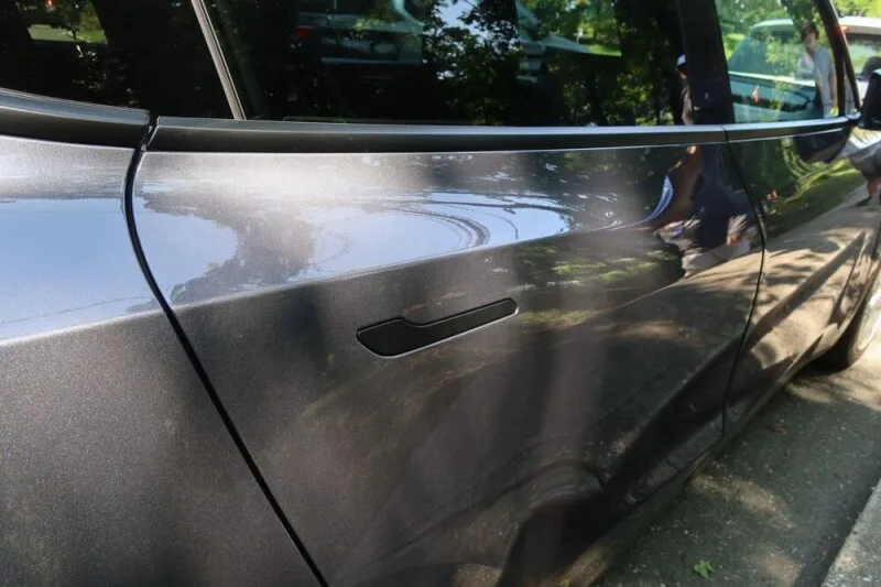 Tesla to recall almost three million vehicles over hidden door handles