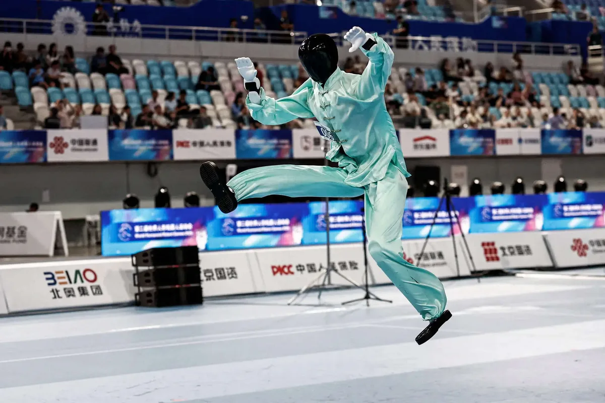 In photos: Humanoid robots sprint, play soccer and set records at Beijing games