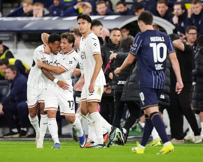 Championship roundup: racist chanting mars Swansea’s win at Millwall