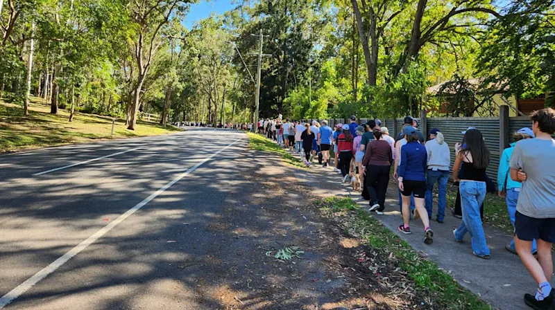 Thousands march along road where woman was allegedly raped