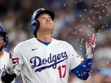Homers from Ohtani and Betts power Dodgers to a 4-2 victory and a sweep of the Royals