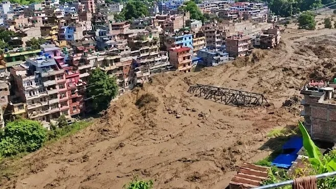Nepal worker clings to mango tree to survive when wall of water came crashing down