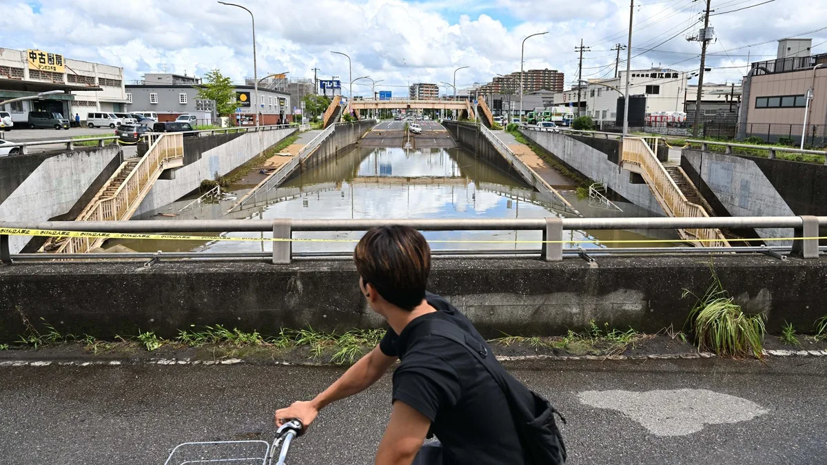 Five dead in Japan after record-breaking rainfall causes severe flooding