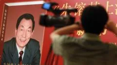China censors public mourning as it holds former premier's funeral