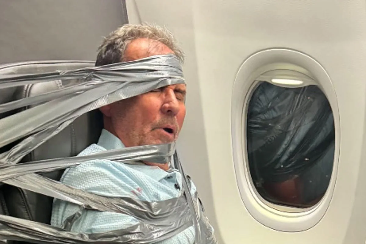 Man who was duct-taped on American Airlines flight after alleged violent outburst breaks his silence
