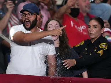 Trump interrupted by protesters as he fights to rally Texas voters