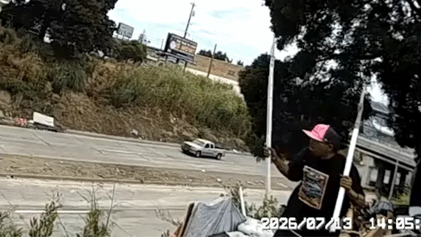 WATCH: Terrifying moment spear-wielding man lunges at California cops before shots ring out