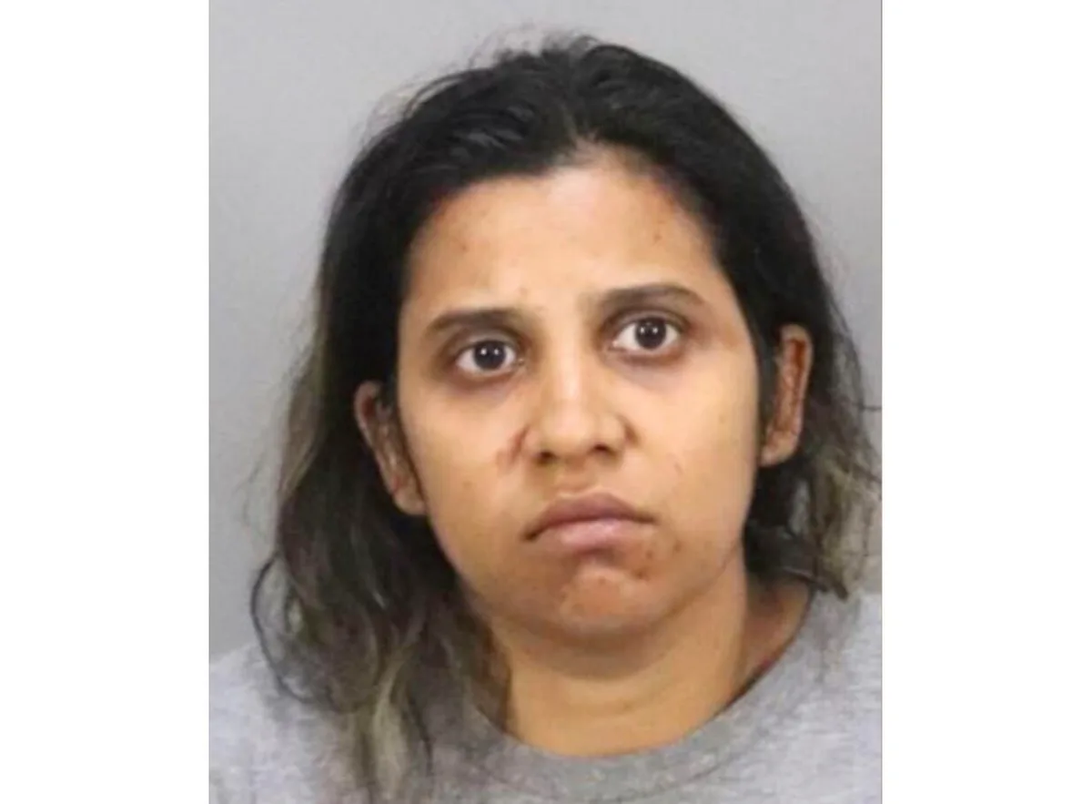 Blood-stained California woman stabbed one victim, drove over another in double killing, police say