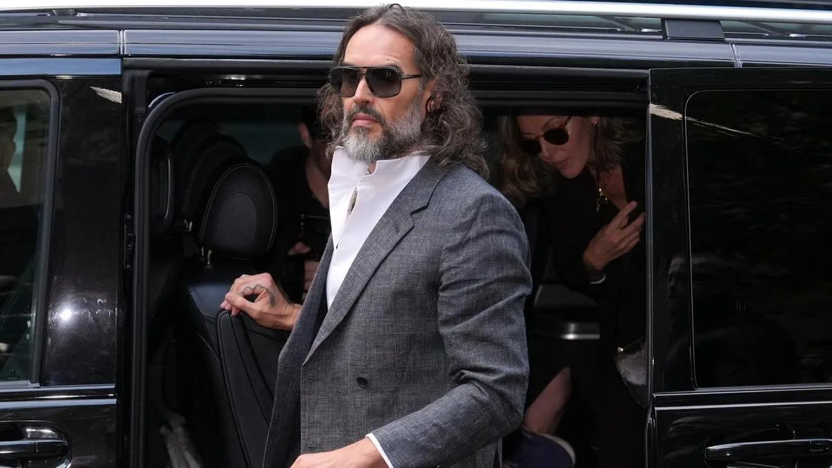 Russell Brand fronts court for rape, sex assault trial