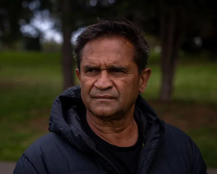 Former AFL star Nicky Winmar jailed for six months for assault on woman