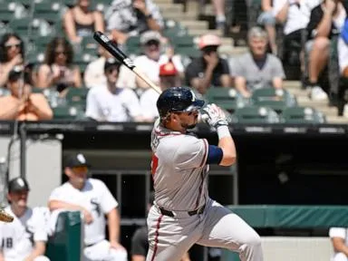 Grant Holmes takes no-hitter into 7th and Riley has 2 RBIs as the Braves top the White Sox 2-0
