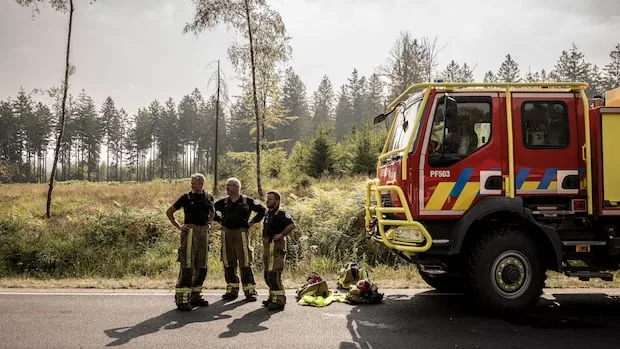 Belgian wildfire approaches Germany despite rain as Greece probes deadly blaze