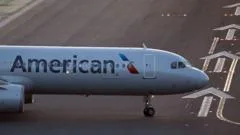 Laptop catches fire on US flight, with passenger treated at airport