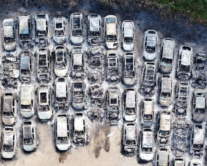 Man arrested on suspicion of arson after fire at car park used by Gatwick passengers