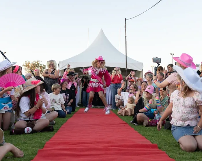 Dollywood down under: Dolly Parton fans and drag queens turn a tiny Australian town pink