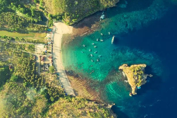British tourist, 54, dies while swimming at beauty spot near Bali on family holiday