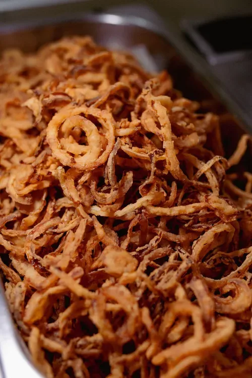 How to make Spur-style onion rings that are thin, crispy, and crunchy