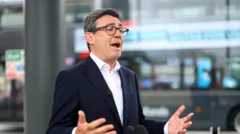 PM says he's not embarrassed about hoax message exchange