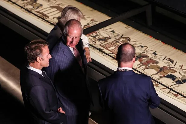King Charles and Emmanuel Macron share lighthearted moment viewing Bayeux Tapestry