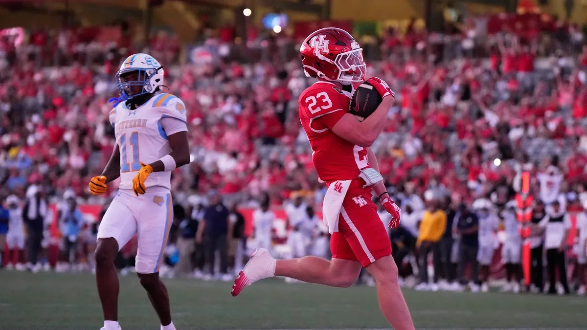 No. 22 Houston routs Southern 77-6 in game played briefly without stadium lights