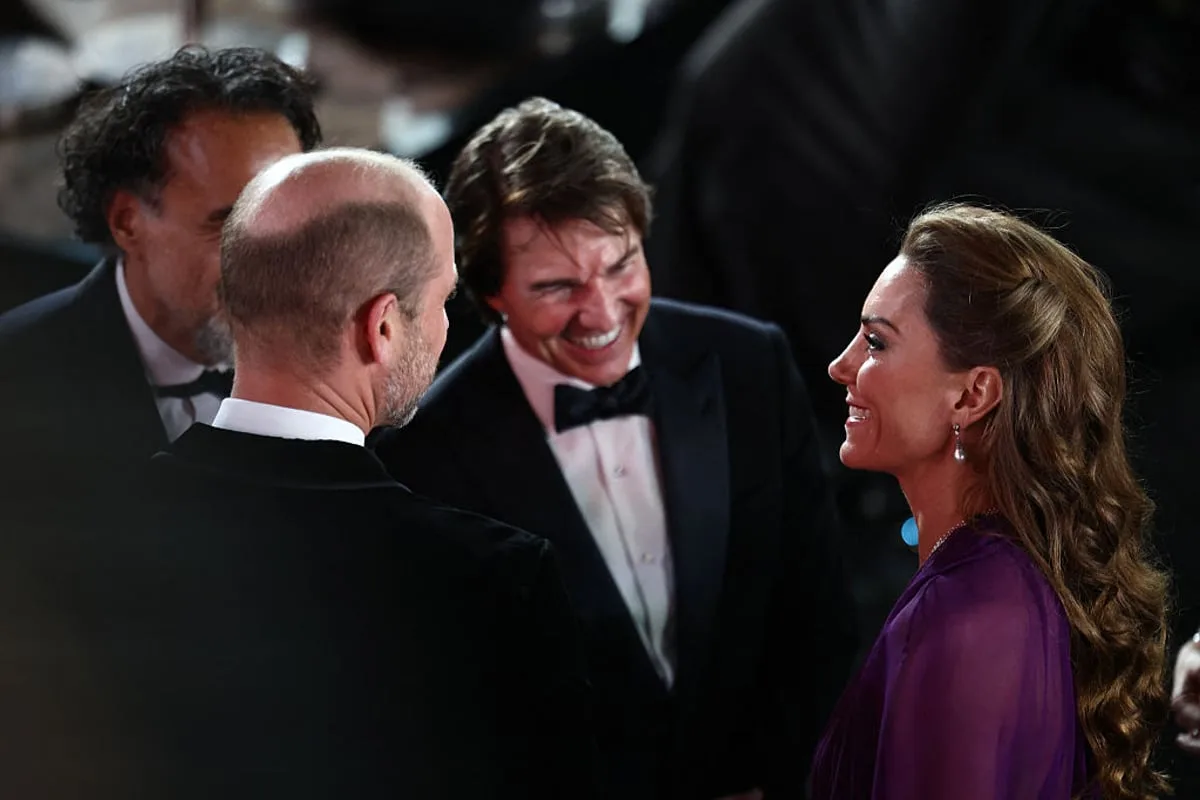 Tom Cruise is the perfect gentleman as he greets Prince and Princess of Wales at Digger premiere in London