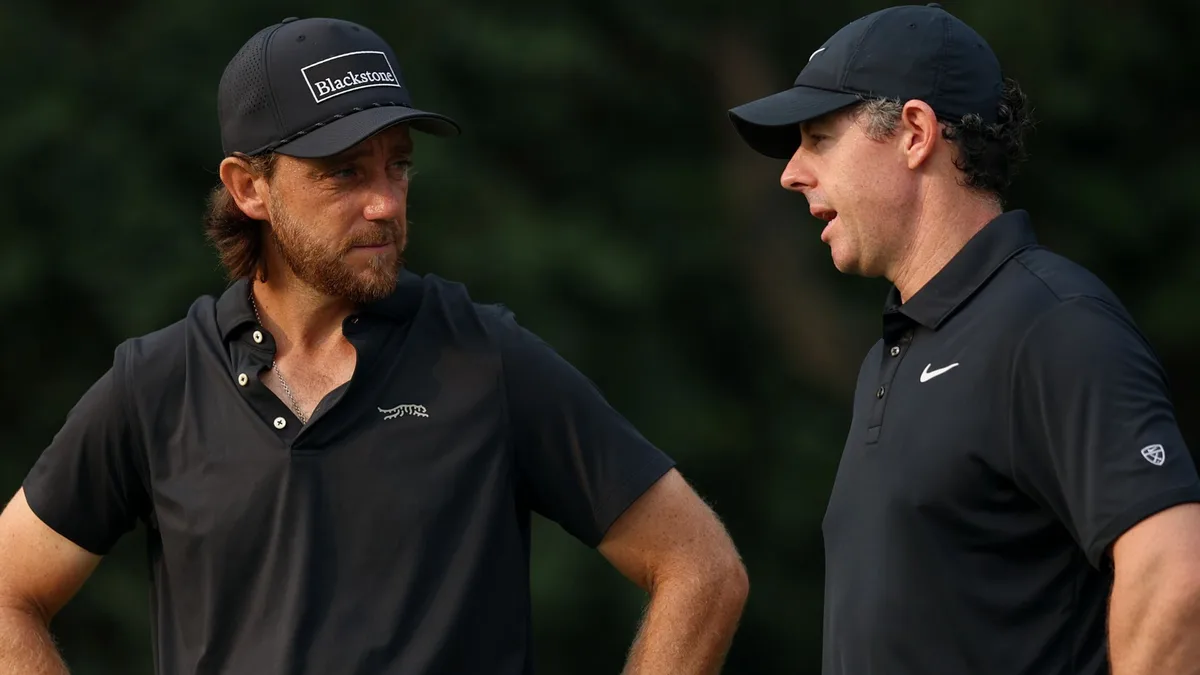 McIlroy four off lead on delayed first day in India