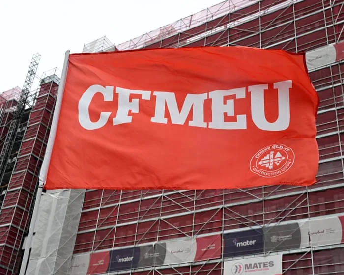 Two men charged and drugs, guns and cars linked to CFMEU seized as police investigate alleged corruption