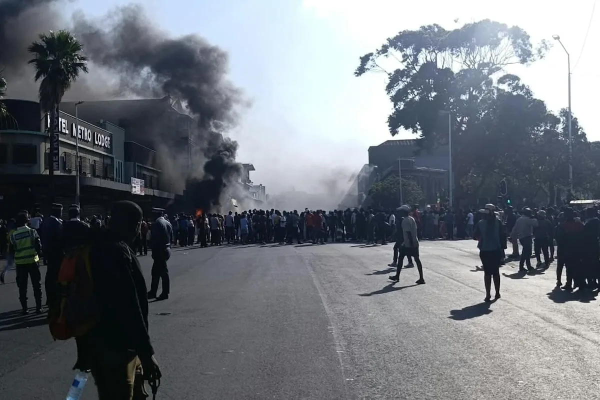 WATCH | Protesters set vehicles alight in Durban CBD