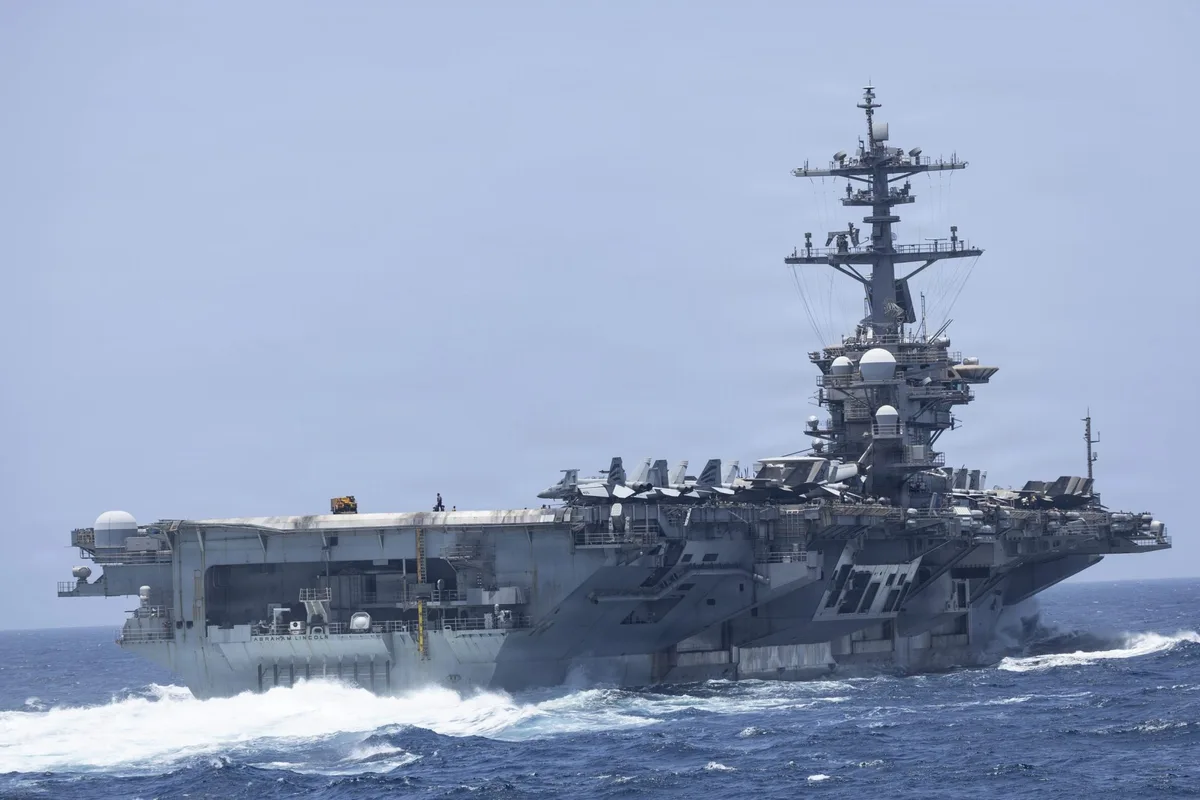 Centcom chief calls carrier’s mission ‘one of the most operationally intense and consequential of the modern era’ amid mental health and supply issues