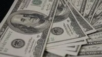 Dólar abre em alta com mercado repercutindo relatório de política monetária