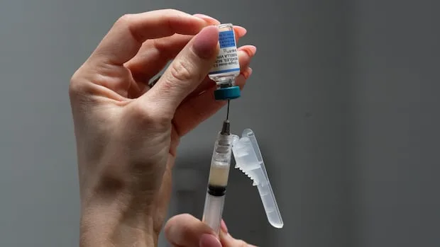 Trump signs executive order calling for fewer childhood vaccinations