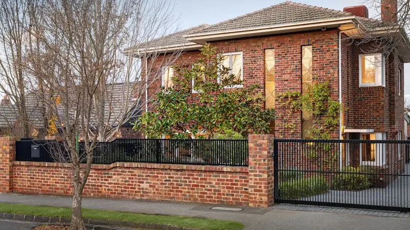 Young family buys $3.92m renovated heritage home in Kew in hot auction